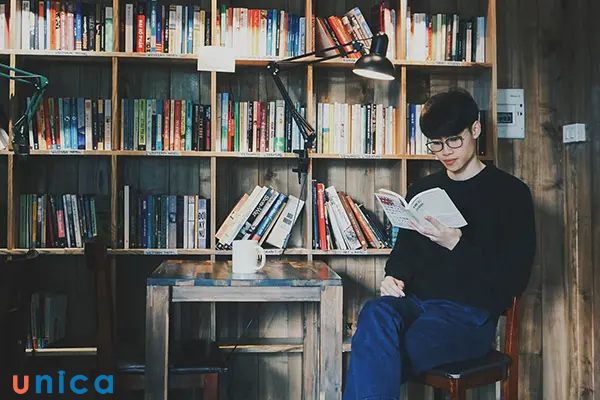 Dáng chụp ảnh nam với sách