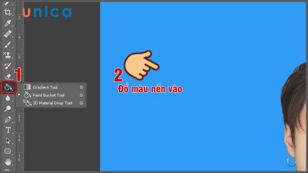 Chọn công cụ Paint Bucket Tool và đổ màu nền xanh vào layer trống