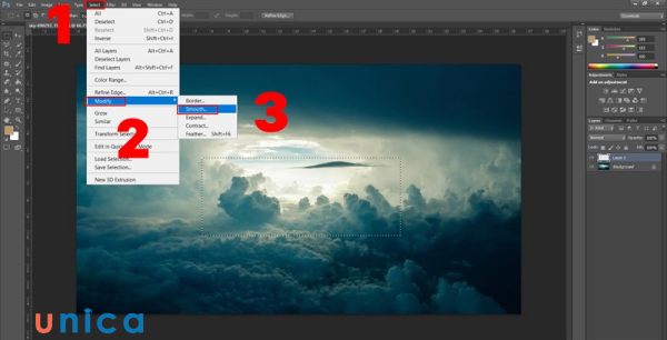 Chọn menu Select > Modify > Smooth để bo góc