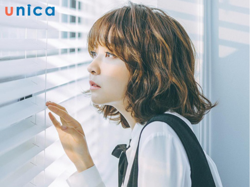 Tóc xoăn nhẹ cho mặt tròn