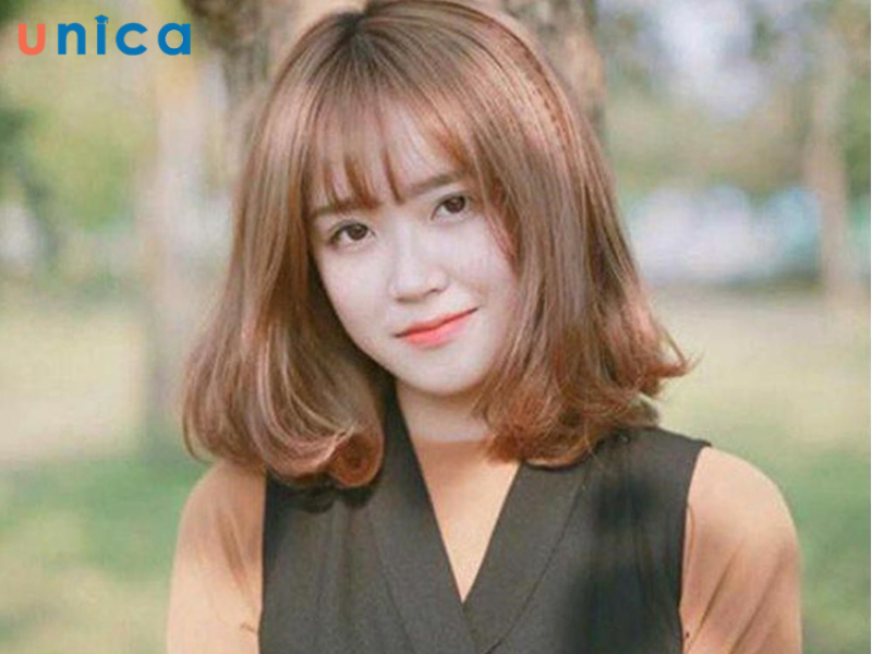 Tóc uốn phần đuôi cho mặt tròn